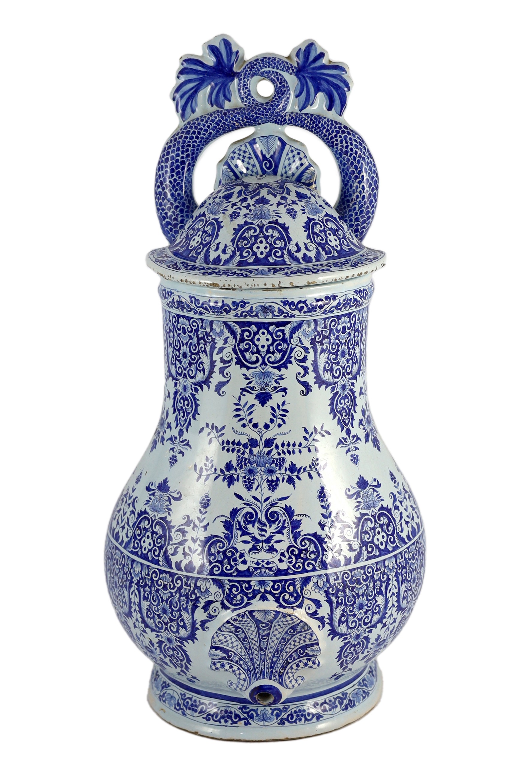 A large Rouen faience blue and white cistern, second quarter 18th century, 57.5cm high, restorations